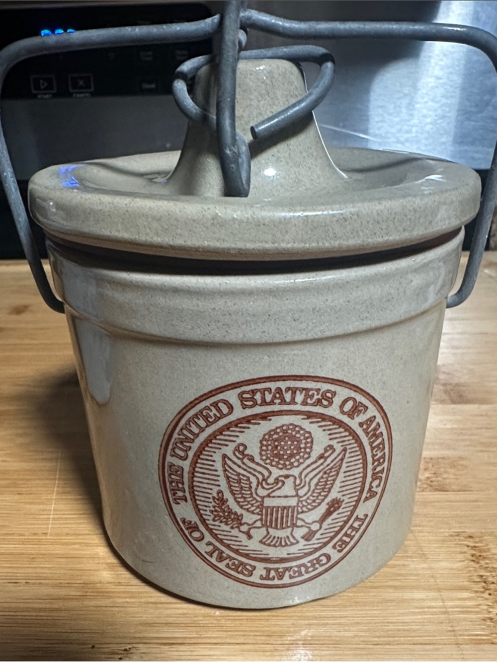 Ceramic Beige Stoneware Crock Jar with U.S. Seal and Wire Handle